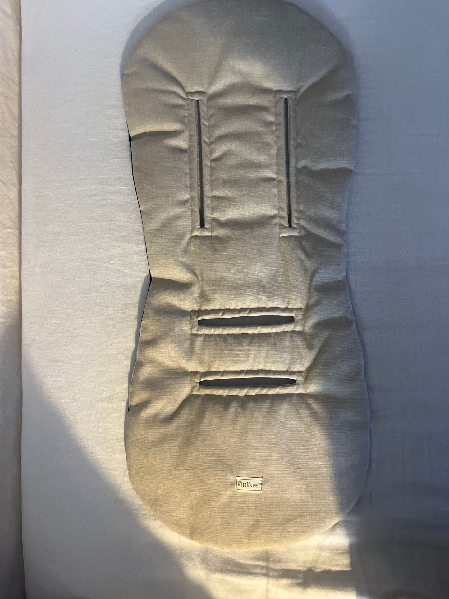 Colchoneta de coche beige lisa